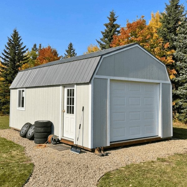 White Premier lofted portable garage with overhead door in autumn, Alberta