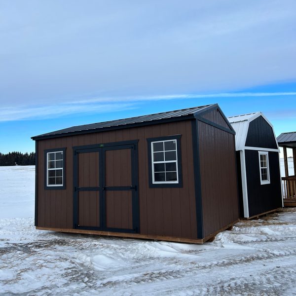 Brown Premier gabled storage shed with double doors and windows in winter