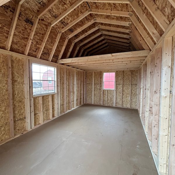 Interior of a Premier lofted storage shed showing framing and storage loft