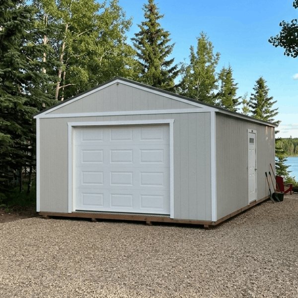 Grey Premier gabled portable garage delivered beside an Alberta lake